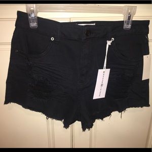 Black distressed cutoff shorts